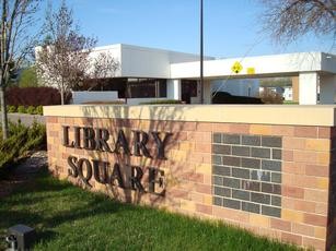 Library Square stone sign in front of the library